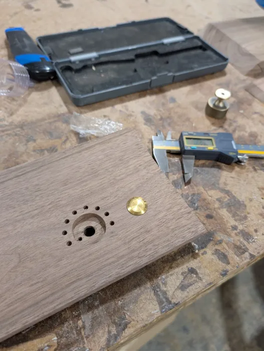 Drilling a walnut faceplate with calipers